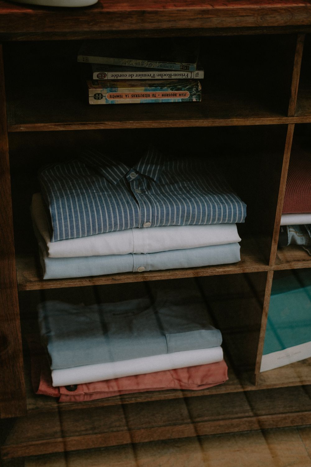 Folded apparel arranged for custom order review and approval.
